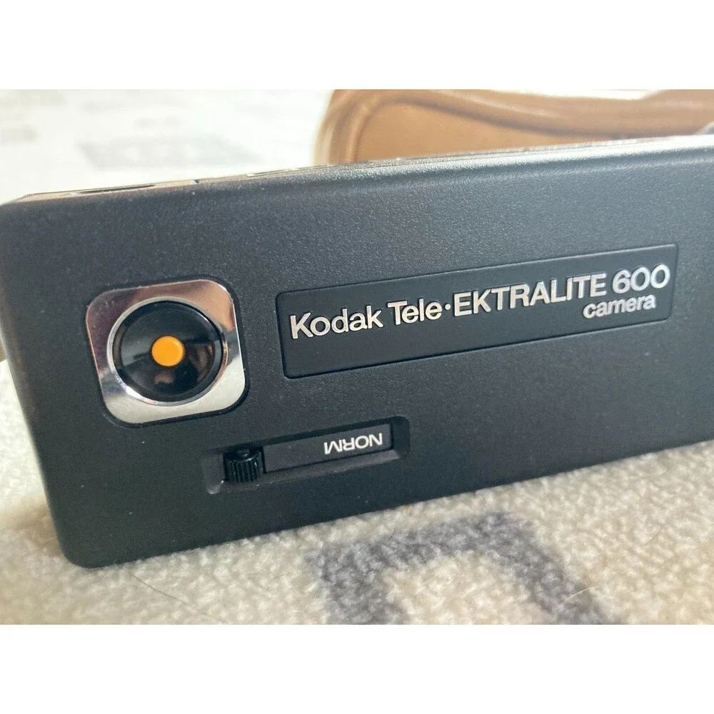 Kodak 600 camera with vintage leather camera case